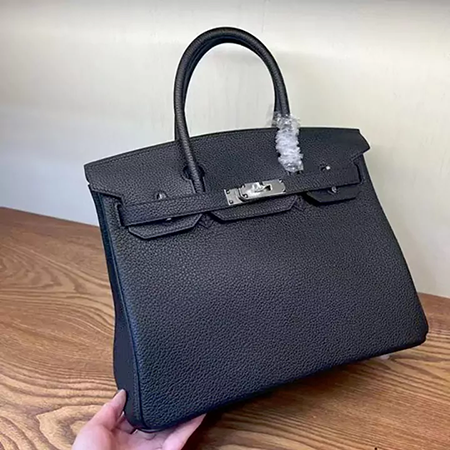 ハンドバッグ ボタン式hermes