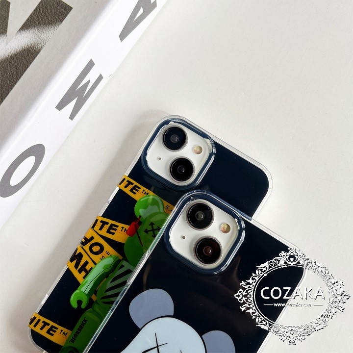 iphone 14 スマホケースカウズ kaws